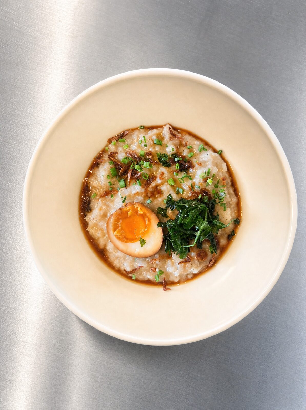 Vietnamese chicken congee (cháo) breakfast at Thuy's cafe in Uluwatu, Bali